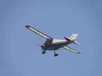 N9066U @ POC - On fly over, it appears pilot working on overhead of his Coyote II - by Helicopterfriend