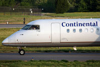 N204WQ @ ORF - Continental Connection (Colgan Air) N204WQ taxiing to RWY 23 for departure to Newark Liberty Int'l (KEWR). - by Dean Heald