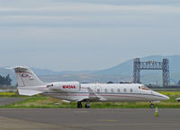 N143AA @ KAPC - 1998 Learjet 60 taxying by Napa River RR Bridge - by Steve Nation