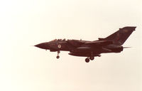ZA595 @ EGQS - Tornado GR.1, callsign Magnum 1, of RAF Honington's Tactical Weapons Conversion Unit on final approach to RAF Lossiemouth in the Summer of 1991. - by Peter Nicholson