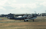 64-14263 @ EGQS - OV-1D Mohawk of the US Army's 3rd Military Intelligence Battalion departing RAF Lossiemouth in September 1989. - by Peter Nicholson