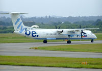 G-JECK @ EGPH - Flybe Dash 8Q-402 waiting to enter runway 06 - by Mike stanners