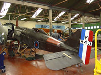G-BKDT @ EGYK - F943 in the workshop at the Yorkshire air museum,Elvington - by Mike stanners