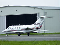 CS-DMQ @ EDI - Netjets Hawker 400XP Taxiing out of the GAT At EDI - by Mike stanners