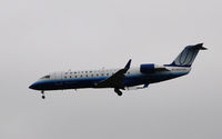 N827AS @ KDOV - CRJ-200 in United Express paint. - by TorchBCT