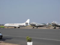 9U-BTA @ BJM - June 2009, parked near 2 C-47 (9U-BRZ, 9U-BRY) in front of the old airport, left side of the V.I.P area ... looks good, in old painting of Air Burundi - by Jacques Molitor via Marie-Claude Dupont