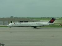 N917DE @ MCI - Taxiing to terminal passing MCI Fire Station - by Helicopterfriend