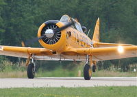 N7704C @ 06C - North American T-6G, departing RWY 11 06C (Schaumburg, IL). - by Mark Kalfas