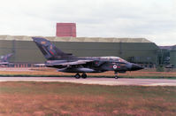 ZA559 @ EGQS - Tornado GR.1, callsign Magnum 2, of the Tactical Weapons Conversion Unit at RAF Honington taxying to the active runway at RAF Lossiemouth in the Summer of 1991. - by Peter Nicholson