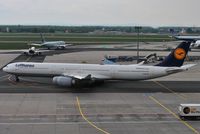 D-AIHF @ EDDF - Lufthansa taxiing for take-off with a queue ahead - by Robert Kearney