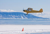 C-FPYS - Low pass over Lake Superior. - by Ron Lacey