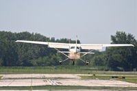 N172SS @ KDPA - Illinois Aviation Academy/ FLYING W LEASING INC Cessna 172L N172SS, over the numbers RWY 33 KDPA. - by Mark Kalfas