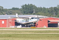 N971N @ KDPA - WORLDWIDE AIRCRAFT LEASING CORP Cessna 208B Grand Carivan, N971N departing 20R KDPA while practicing full stop landings. - by Mark Kalfas