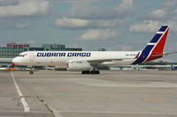 CU-C1703 @ CYYZ - Cubana Cargo taxing to cargo terminal beside U.S.A.F C17 - by saleem Poshni