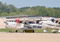 N5138Q @ KDPA - UNIVERSITY OF DUBUQUE Cessna Skyhawk C172/G, N5138Q getting a pre-flight before a trip to KDBQ. - by Mark Kalfas