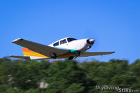 N7711 @ 7B9 - Piper Comanche departing Ellington, CT - by Dave G