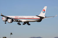 B-6050 @ LAX - China Eastern B-6050 seconds from landing on RWY 24R. - by Dean Heald