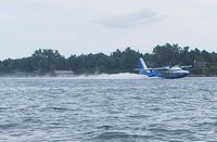N98TP @ 4R5 - As seen Monday July 5th, 2010.
Landing in front of La Pointe, Madeline Island. - by Gilles Cochet