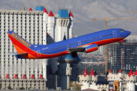 N627SW @ LAS - Southwest Airlines N627SW (FLT SWA1789) climbing out from RWY 1R, in front of the Excalibur Hotel, enroute to Ontario Int'l Airport (KONT). - by Dean Heald