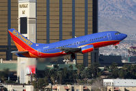 N519SW @ LAS - Southwest Airlines N519SW (FLT SWA37) climbing out from RWY 1R, in front of Mandalay Bay, enroute to El Paso Int'l (KELP). It was nice to see one of the 25 737-500s in Southwest's fleet. - by Dean Heald