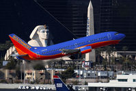 N397SW @ LAS - Southwest Airlines N397SW (FLT SWA1377) climbing out from RWY 1R with the Luxor Sphynx in the background, enroute to Los Angeles Int'l (KLAX). - by Dean Heald