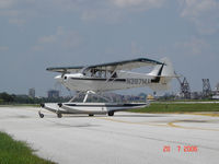 N397MA @ KTPF - Engine run-up prior to take-off from Tampa - by Luc Pieterbourg