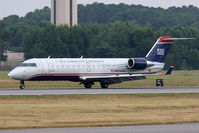 N434AW @ ORF - Not a standard regularly-scheduled flight, US Airways Express (Air Wisconsin) N434AW (FLT AWI9365) from Myrtle Beach Int'l (KMYR) rolling out on RWY 5. - by Dean Heald