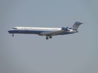 N756SK @ ONT - United Express, exPlus on final to 26R - by Helicopterfriend