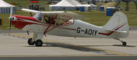 G-AOIY @ EGXW - departing after the airshow - by Paul Lindley