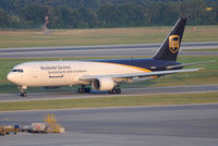 N313UP @ LOWW - UPS Boeing 767-34AF - by Chris J