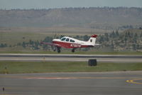 N7927R @ KBIL - Rocky Mountain College Aviation Beechcraft Bonanza E33C - by Daniel Ihde