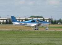 N644CK @ KAXN - Cirrus SR22 departing runway 31. - by Kreg Anderson
