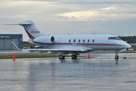 N304EM @ PANC - Early morning shot of 2005 Bombardier BD-100-1A10, c/n: 20077 at Anchorage - by Terry Fletcher