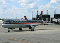 N181UW @ KORD - Still wearing its old colors, a US Airways A321 makes its way to its gate at O'Hare. - by Daniel L. Berek