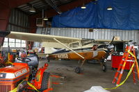 N4395B @ KEOK - Old bird in the hangar for maintenance