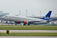 LN-BUF @ EGCC - SAS Boeing 737-405, c/n: 25795 departs from Manchester Uk - by Terry Fletcher