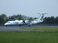 G-ECOA @ EDI - Jersey 1130 turning off runway 24 - by Mike stanners