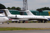 N1759C @ EGGW - 2006 Gulfstream Aerospace GV-SP (G550), c/n: 5128 parked on Luton 'Pond' - by Terry Fletcher