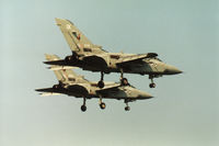 ZE936 @ EGQL - Tornado F.3 of 43 Squadron with Tornado F.3 ZE 942 on final approach to RAF Leuchars in April 1990. - by Peter Nicholson