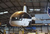 G-DELB @ X3DT - Robinson R22 Beta (minus rotorblades) at the AeroVenture, Doncaster - by Ingo Warnecke