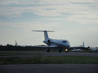 N300UJ @ CYQB - Arriving with Will I Am from The Black Eyed Peas group on board. - by olinadeau