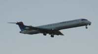 N820SK @ KMSP - Poor photo of a Delta Connection CRJ landing at MSP. - by Kreg Anderson