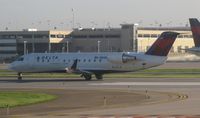 N8488D @ KMSP - Delta Connection CRJ beginning its takeoff roll at MSP. - by Kreg Anderson