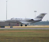 N855BB @ KAUS - Citation touches down 17L. - by Darryl Roach