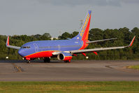 N738CB @ ORF - Southwest Airlines N738CB (FLT SWA21) exiting RWY 5 after arrival from Baltimore/Washington Int'l (KBWI). - by Dean Heald