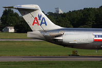 N450AA @ ORF - Tail shot of American Airlines N450AA (FLT AAL682) from Dallas/Fort Worth Int'l (KDFW) taxiing to the gate. You can see that the engine is canted upward and the vortex generator on it, that is to aid in directional stability at high angles of attack. - by Dean Heald