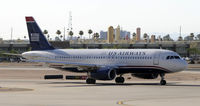 N637AW @ KPHX - Taxiing at PHX - by Todd Royer