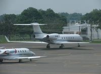 N1JN @ KOSU - One of several Gulfstreams in town for the Memorial Tournament - by Kevin Kuhn