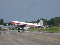 N143D @ KOSH - Herpa Wings DC-3 taxing at Oshkosh - by steveowen