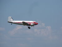 N143D @ KOSH - On Finals at Oshkosh During the Mass arrival of DC-3's - by steveowen